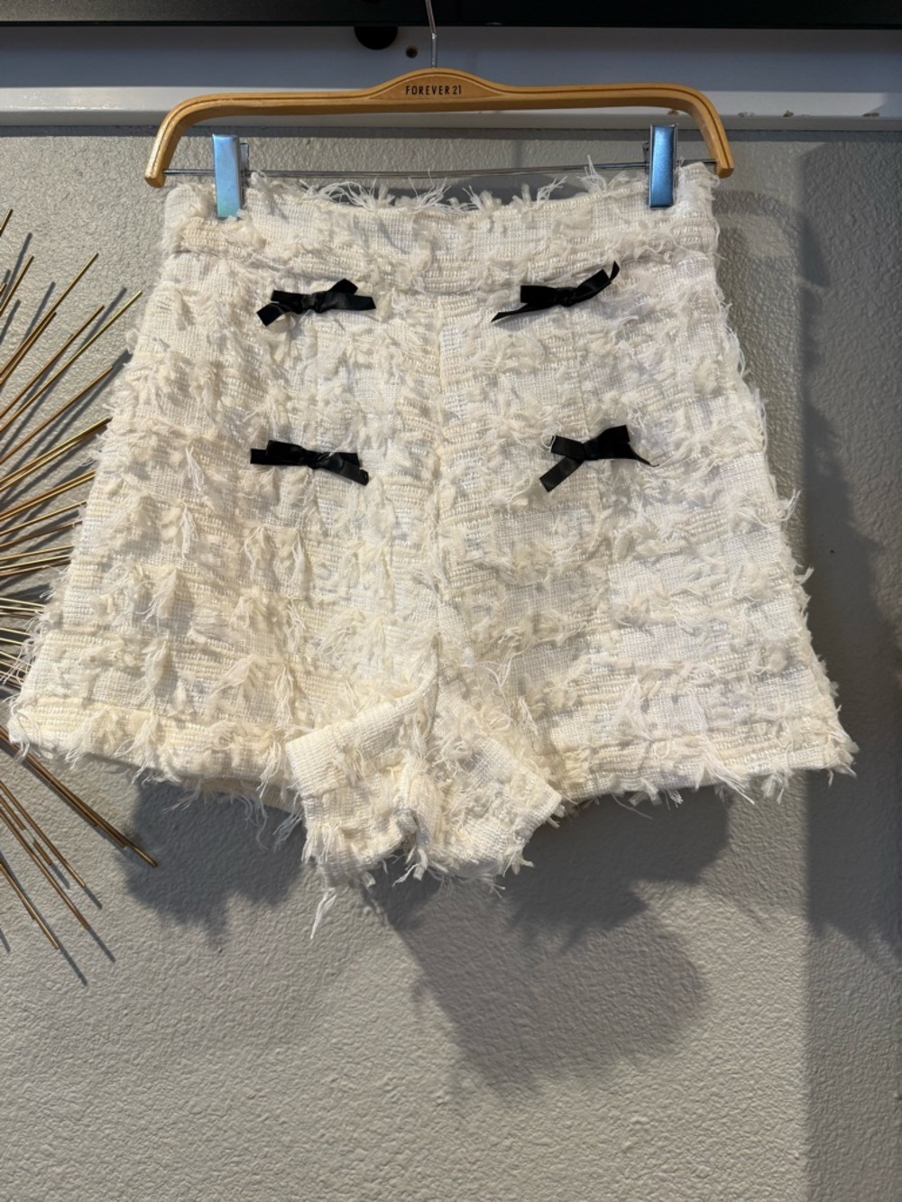 High-Waist White Tweed Shorts with Black Bow Accents